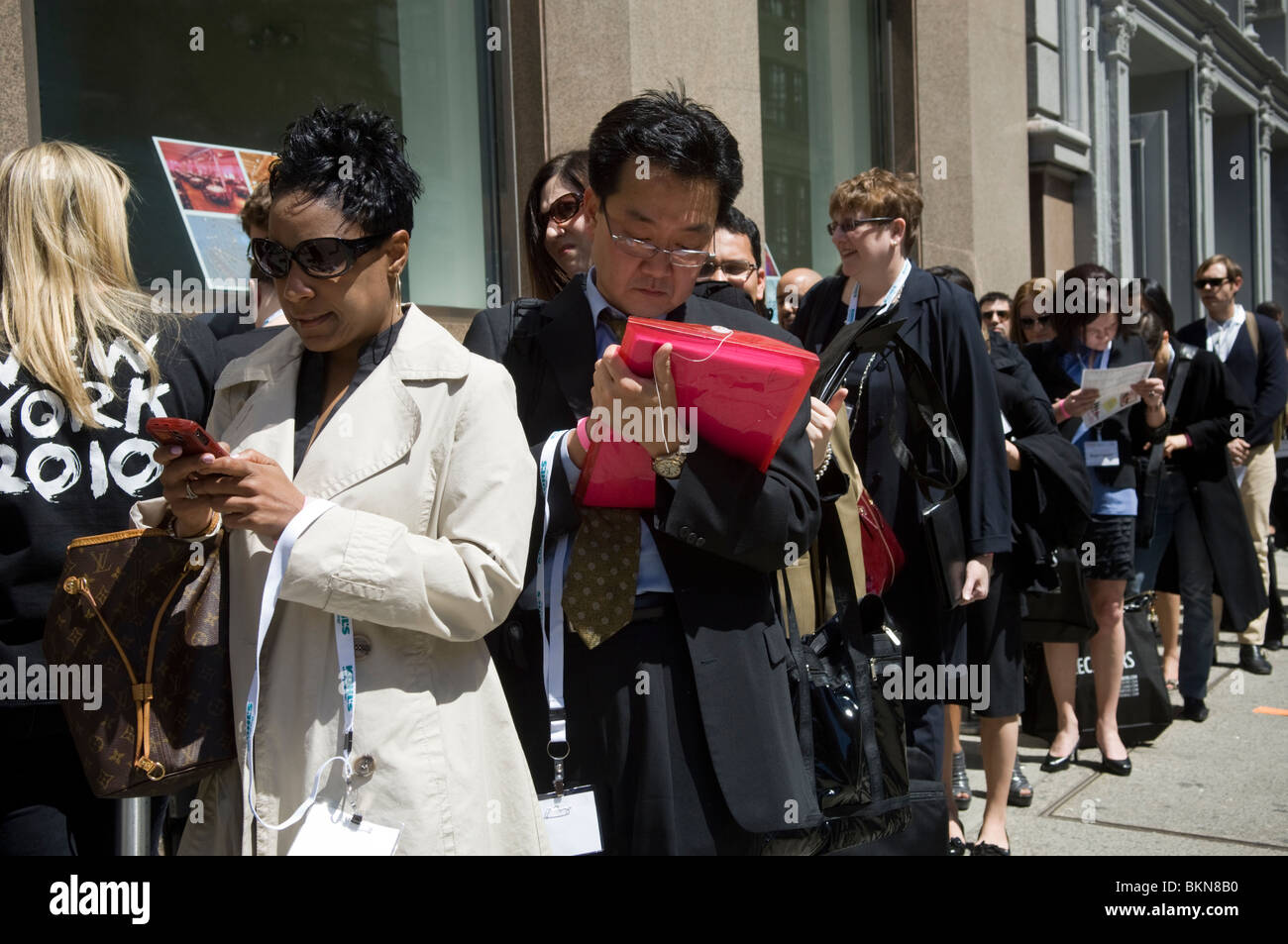 Job seekers line up for a fashion Career Fair at the Metropolitan Pavilion in New York Stock Photo