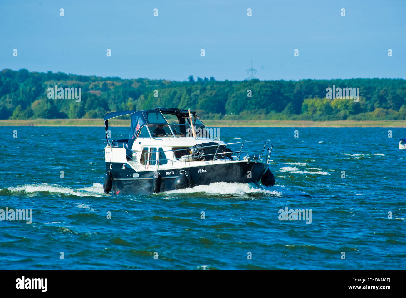 Charter yacht in rough water on Fleesensee, Mecklenburg Western