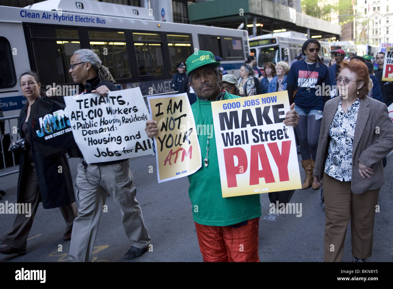 AFL-CIO and other Unions members march to Wall Street along Broadway demanding good jobs and that banks & Wall Street pay their Stock Photo