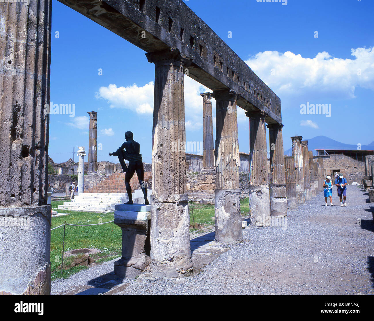 Statue of Apollo and columns, Sanctuary of Apollo, Ancient City of Pompeii, Pompei, Metropolitan City of Naples, Campania Region, Italy Stock Photo