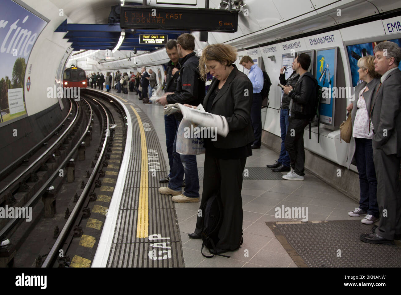 Evening Rush Hour - Embankment Station - London Underground Stock Photo