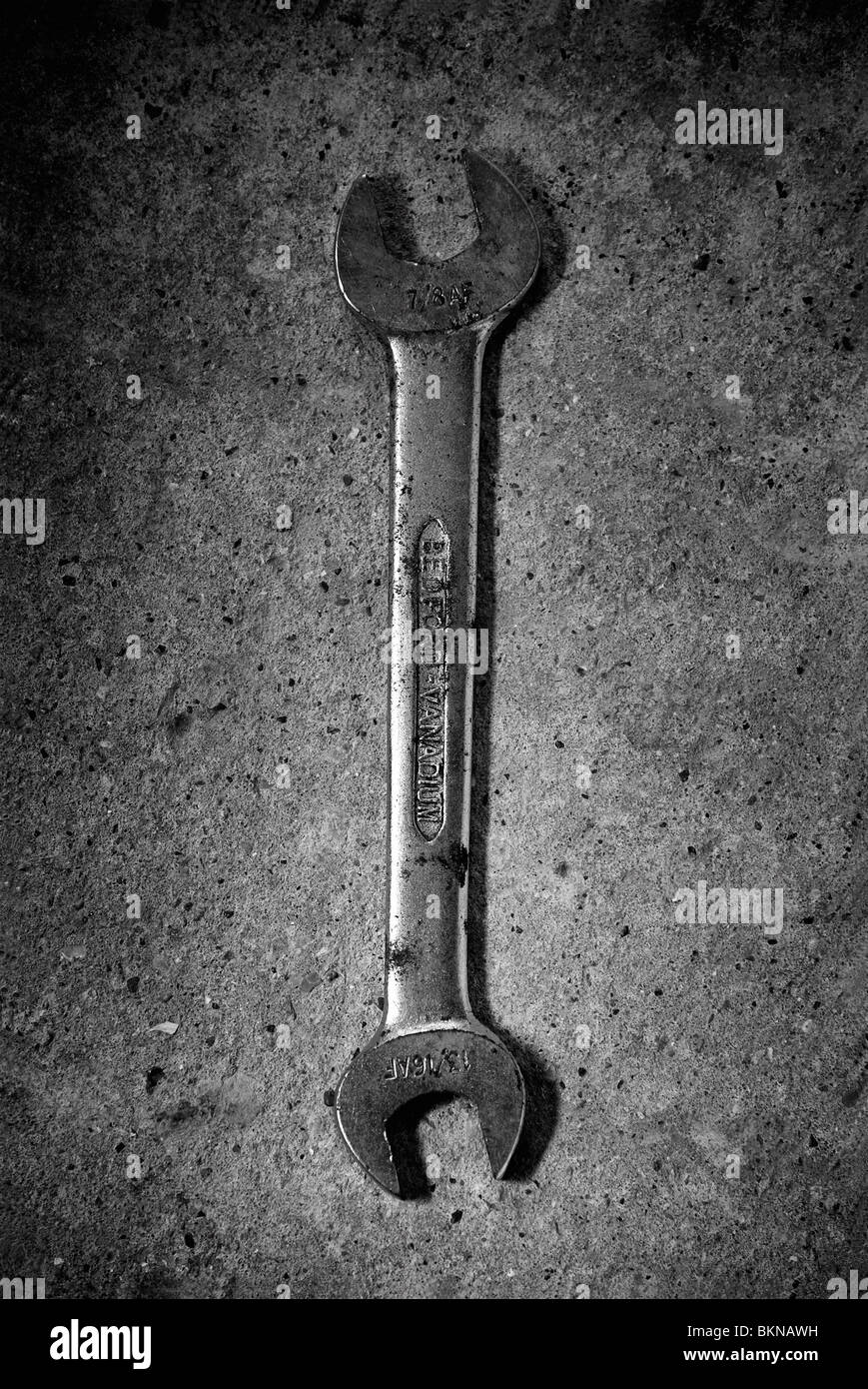 A spanner ( wrench) photographed on a concrete floor Stock Photo Alamy