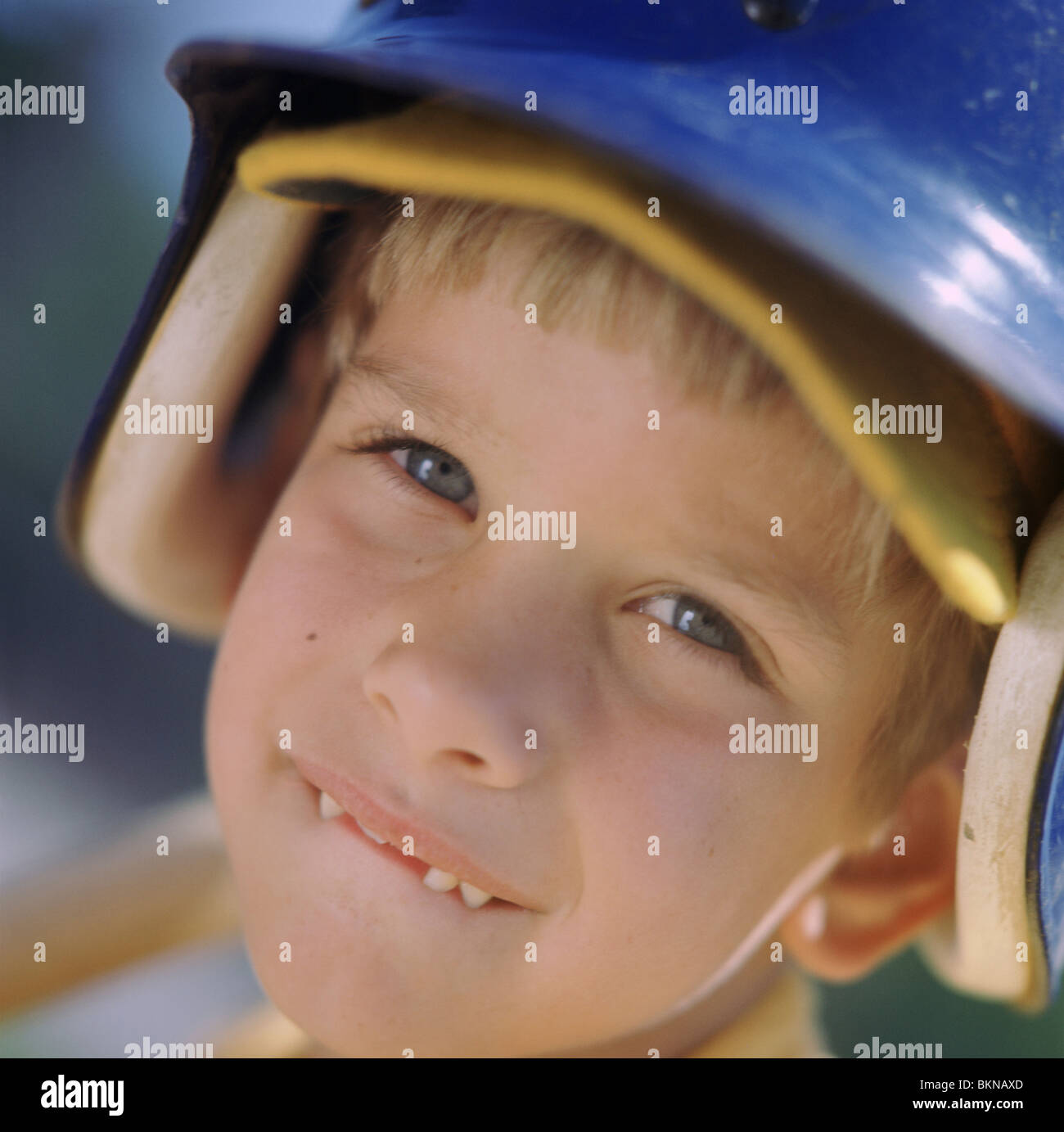 Premium Photo  Portrait of excited amazed baseball player kid child  wearing helmet and hold baseball bat