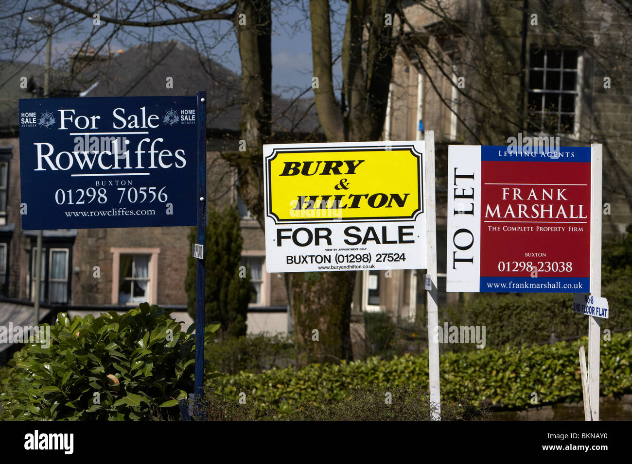 for sale and to let estate agent signs in Buxton Derbyshire England UK Stock Photo