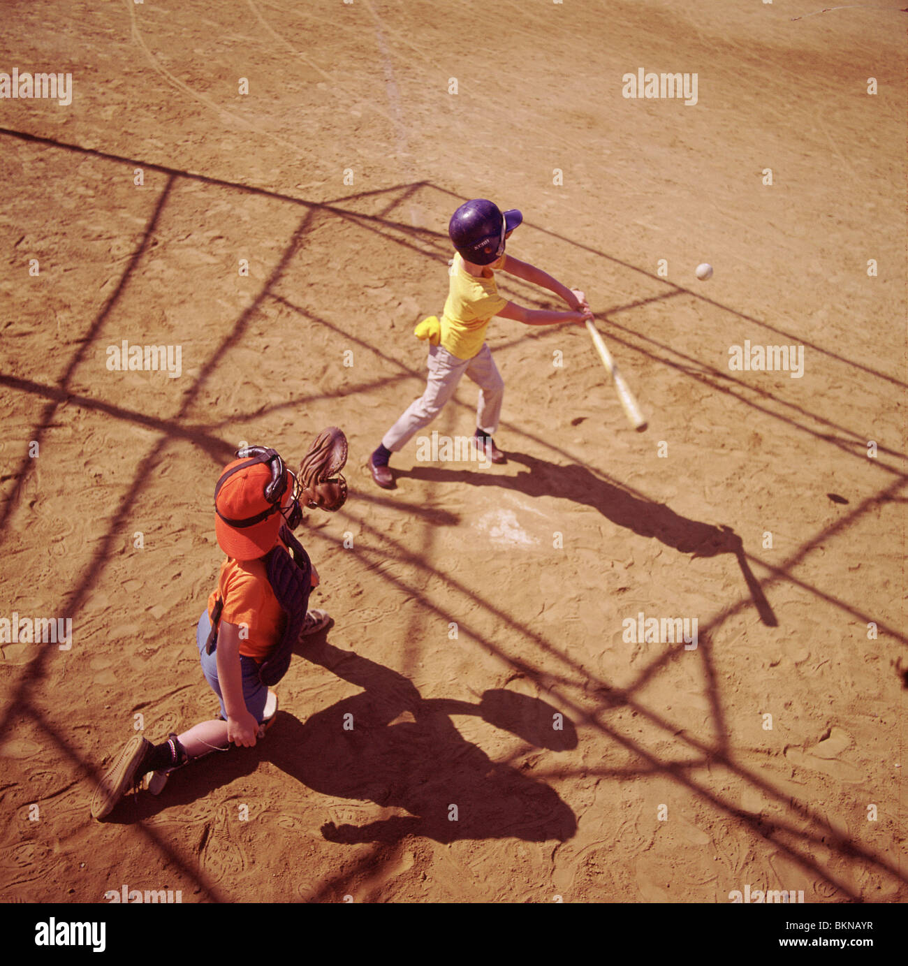 Overhead view of two boys playing in a baseball game Stock Photo