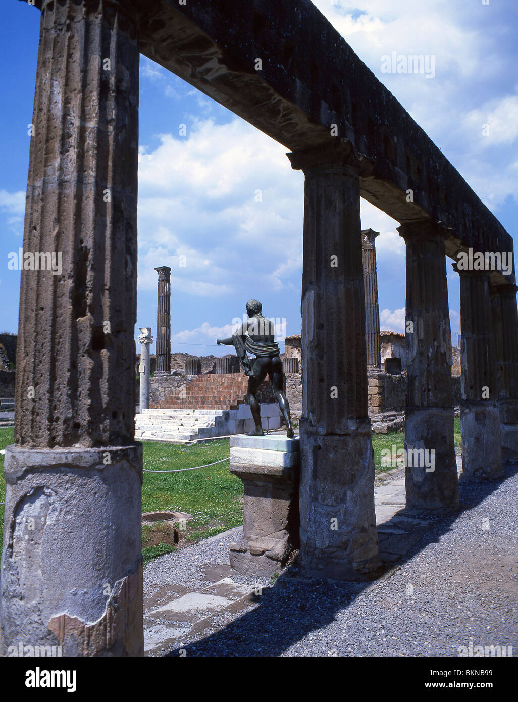 Statue of Apollo and columns, Sanctuary of Apollo, Ancient City of Pompeii, Pompei, Metropolitan City of Naples, Campania Region, Italy Stock Photo