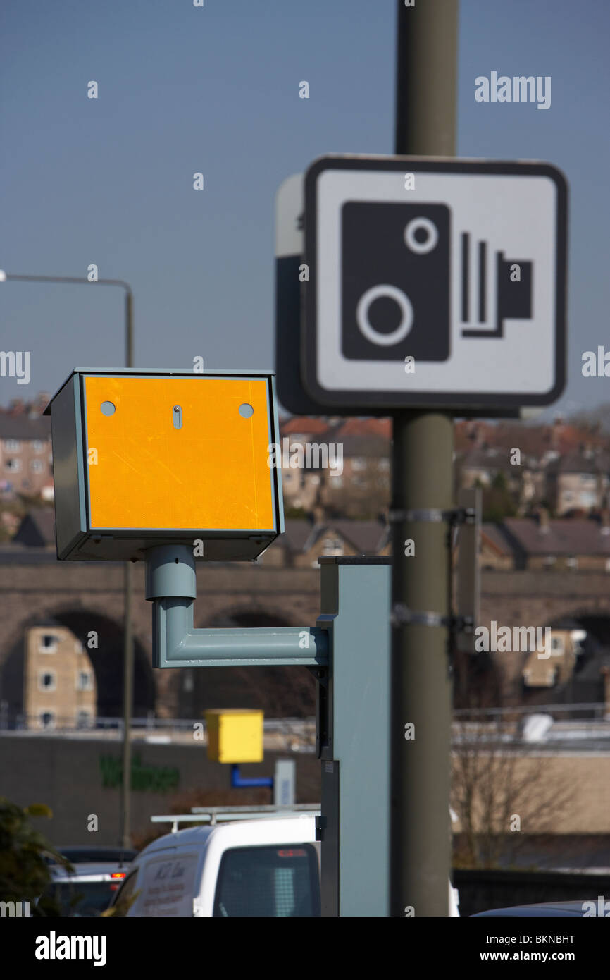 yellow speed traffic cameras and warning signs on a road in Buxton Derbyshire England UK Stock Photo