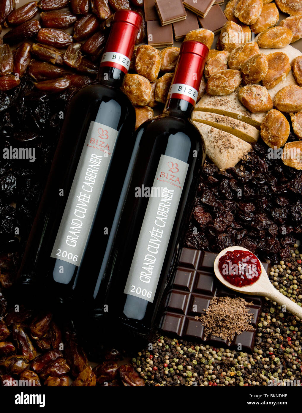bottles of wine with dried fruit, chocolate and gingerbread Stock Photo