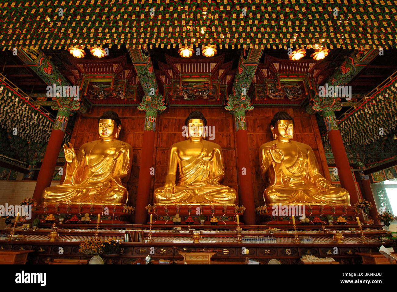 Three Golden Buddha Statues Inside Jogyesa Temple in Seoul, South Korea