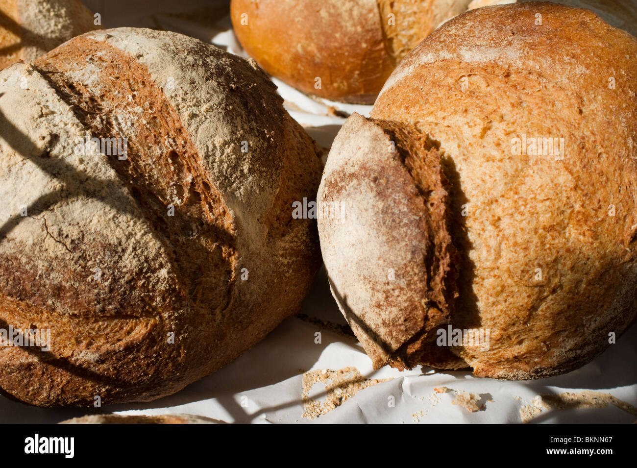 Sourdough bread cobs for sale in farmers' market, Kelso, Scotland Stock Photo