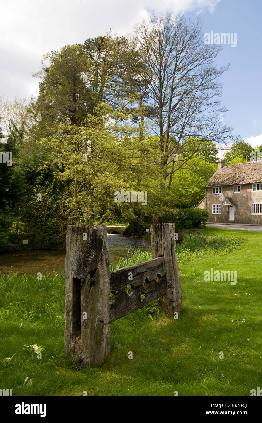 Old wooden stocks at Glympton, near Woodstock, West Oxfordshire. Stock Photo
