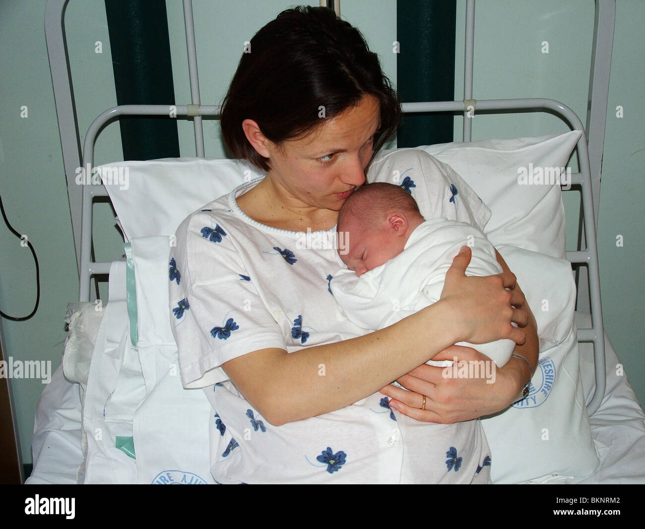 Mother holding new born baby, Maternity Unit, Withybush Hospital