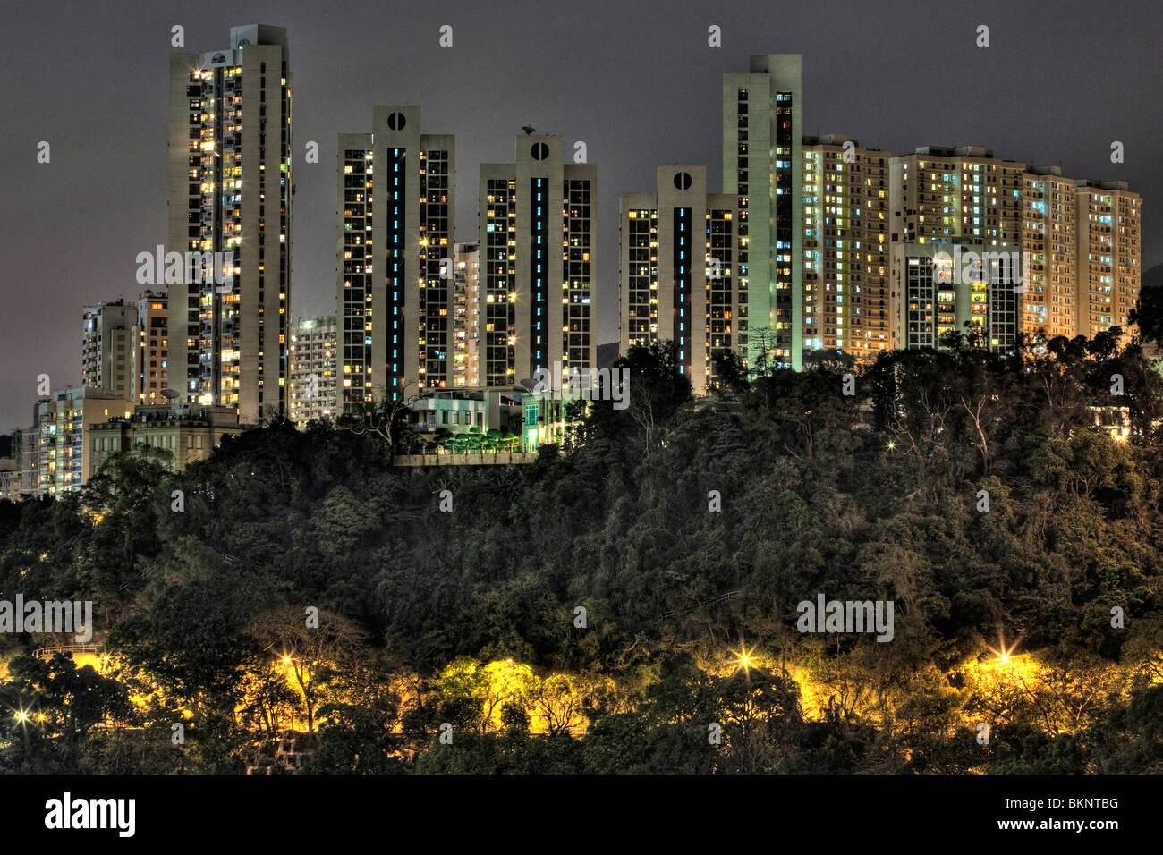 Tall buildings in Hong Kong Island city centre at night Stock Photo - Alamy
