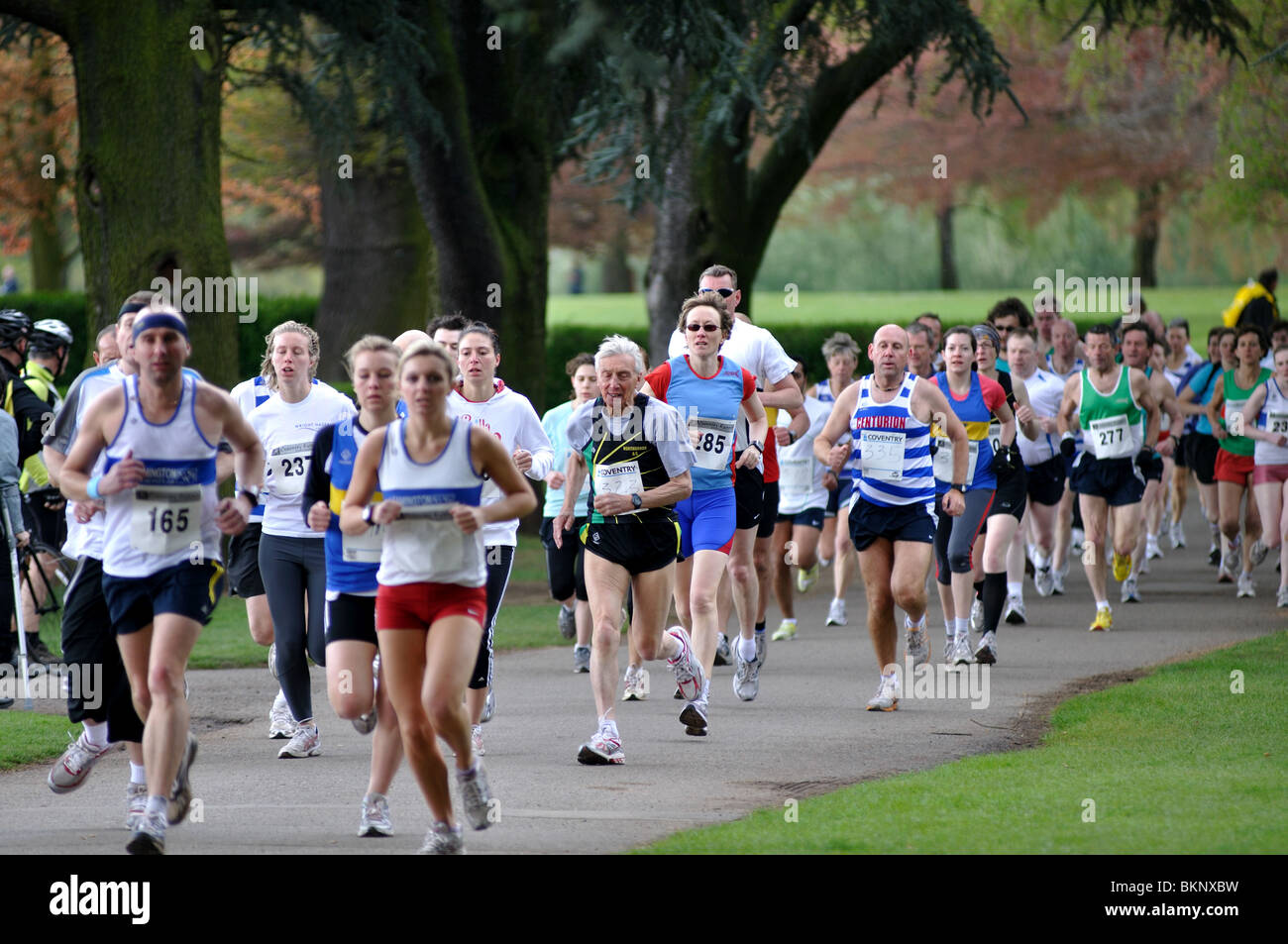 Runners in race in Memorial Park, Coventry, West Midlands, England, UK Stock Photo