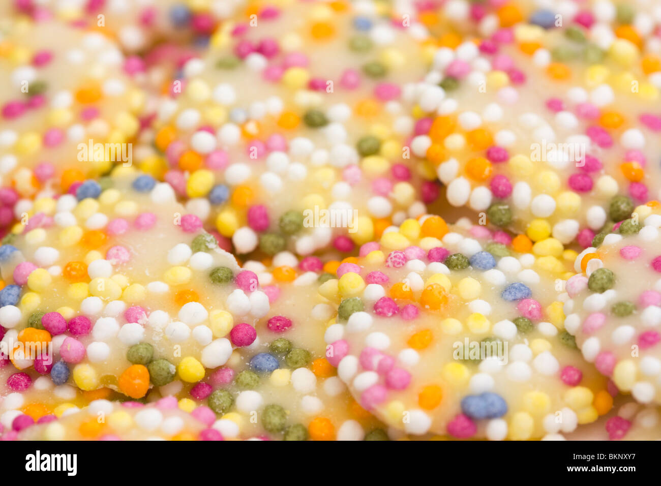 white chocolate buttons with sprinkles Stock Photo