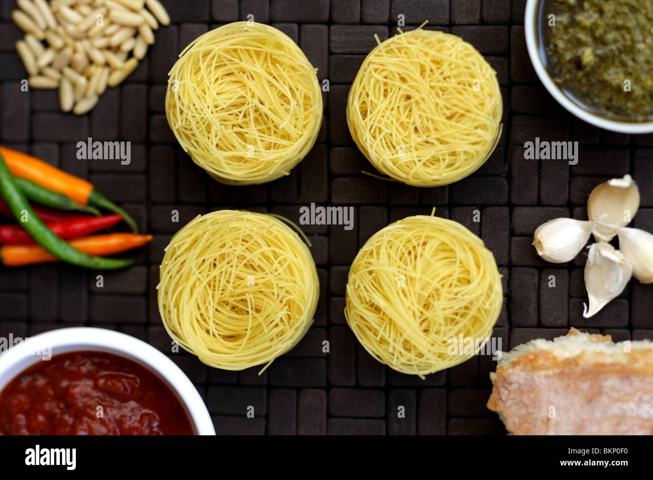 Dry Italian or Mediterranean Style Vermicelli Pasta Nests With Red And