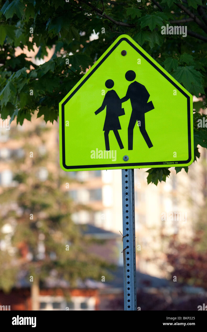 yellow school student crossing sign road street Stock Photo