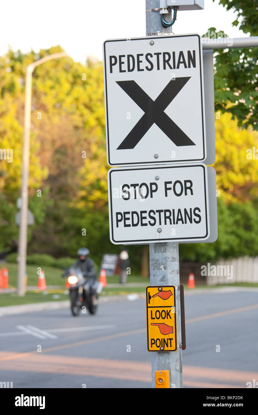 pedestrian walkway sign safe crossing cross Stock Photo