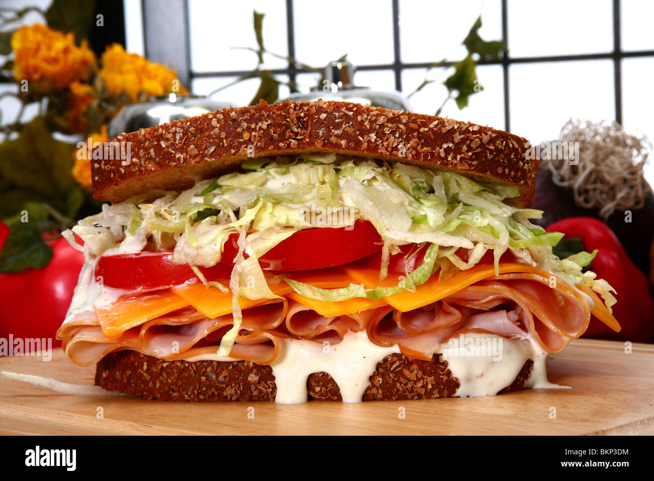 Turkey and cheese sandwich with lettuce, tomato, ranch Stock Photo Alamy