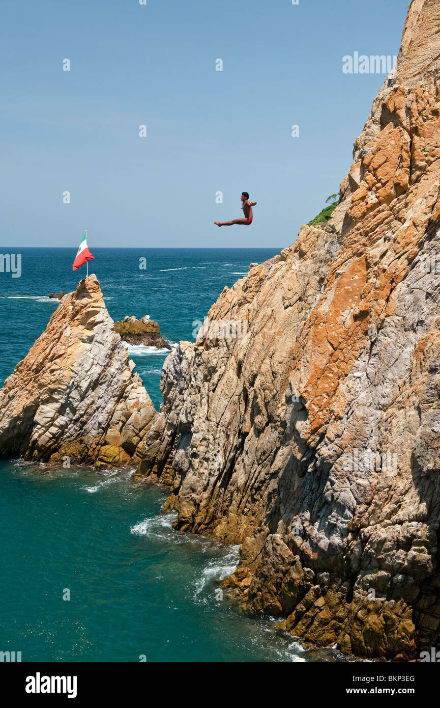 Cliff Diver in a Somersault, La Quebrada Acapulco, Mexico Stock Photo