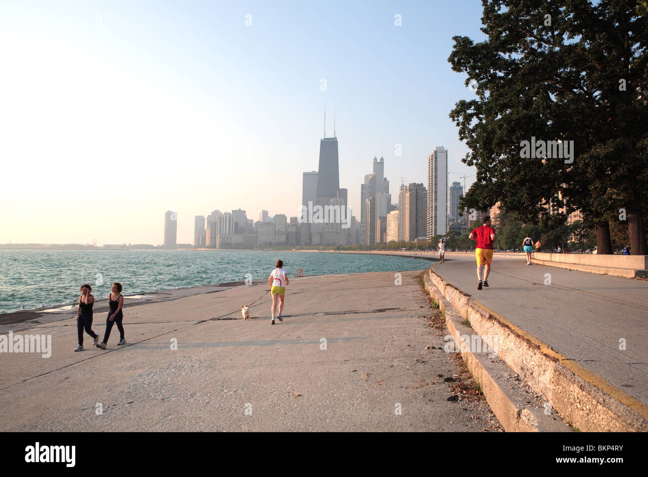 RUNNERS AND WALKERS AT CHICAGO DOWNTOWN LAKEFRONT  Stock Photo