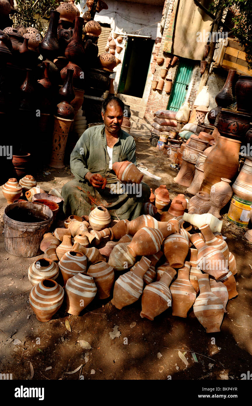 Cairo Egypt pottery plaster cast image figure on the boarder of the City of  the Dead Qarafa Arafa Stock Photo - Alamy