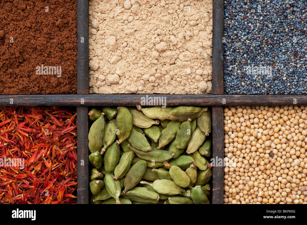 Indian spices in an old wooden tray Stock Photo Alamy