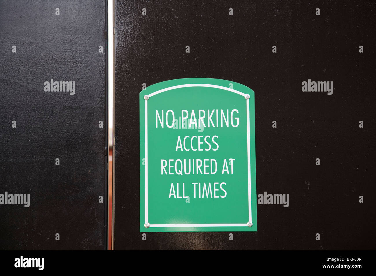 No Parking Access Required At All Times Green Sign England Stock no-parking-access-required-at-all-times-green-sign-england-stock