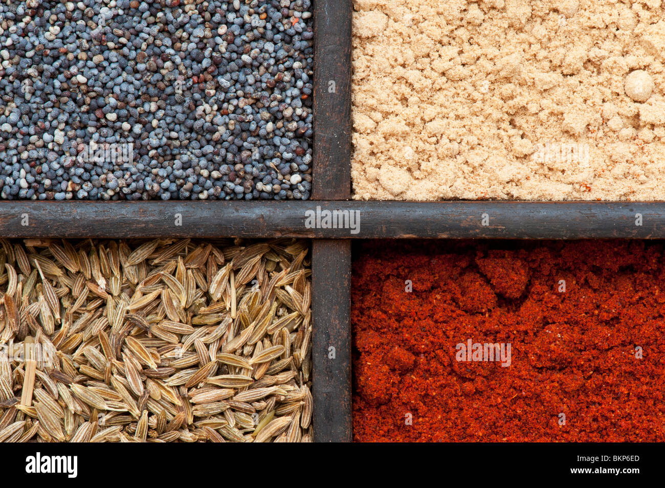 Indian spices in an old wooden tray Stock Photo Alamy