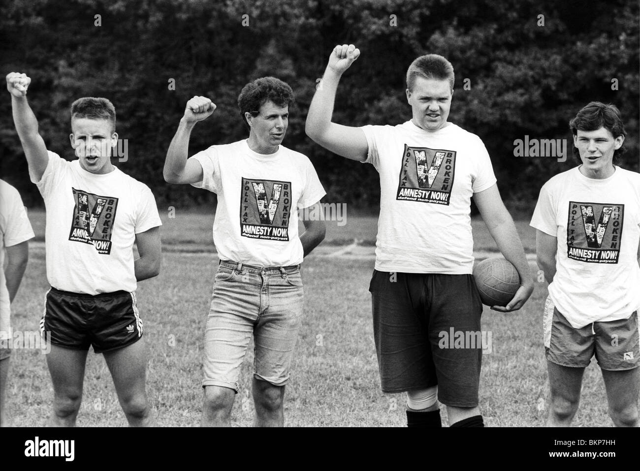 Socialist footballers sing the 'Red Flag' before a match at Militant Youth Rights Campaign summer camp in the Forest of Dean Stock Photo