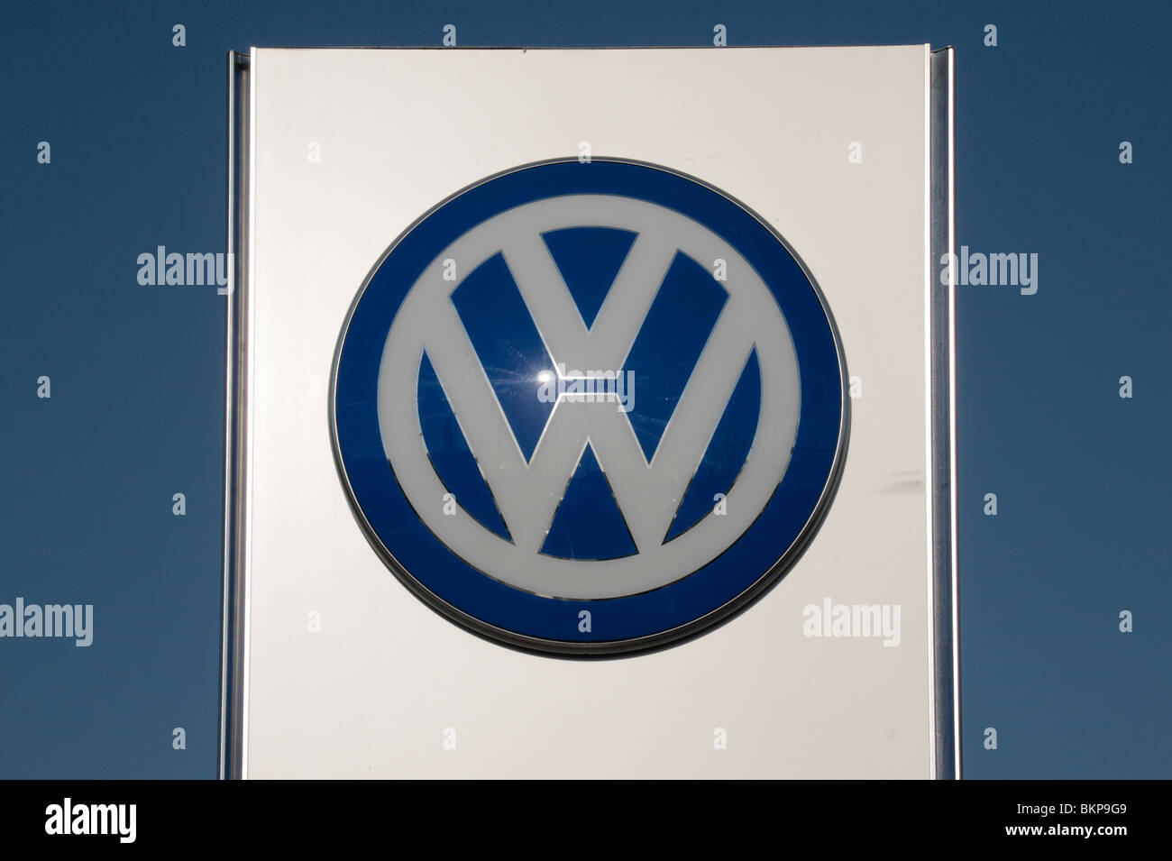 The VW Volkswagen logo outside a dealership on the Great West Road, Brentford, UK. Stock Photo