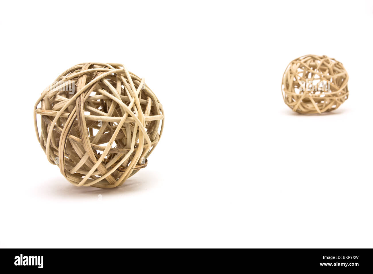 Woven wickerwork ball made from bamboo, reed or willow isolated against ...