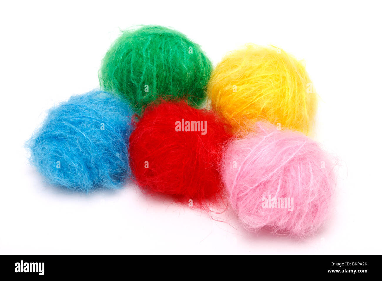 selection of Vibrant Mohair wool isolated against white background. Stock Photo