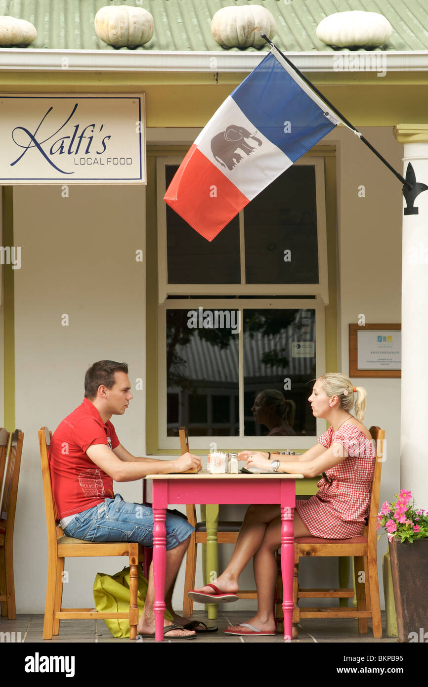 A couple sitting at Kalfi's restaurant in Franschhoek, Western Cape Province, South Africa. Stock Photo