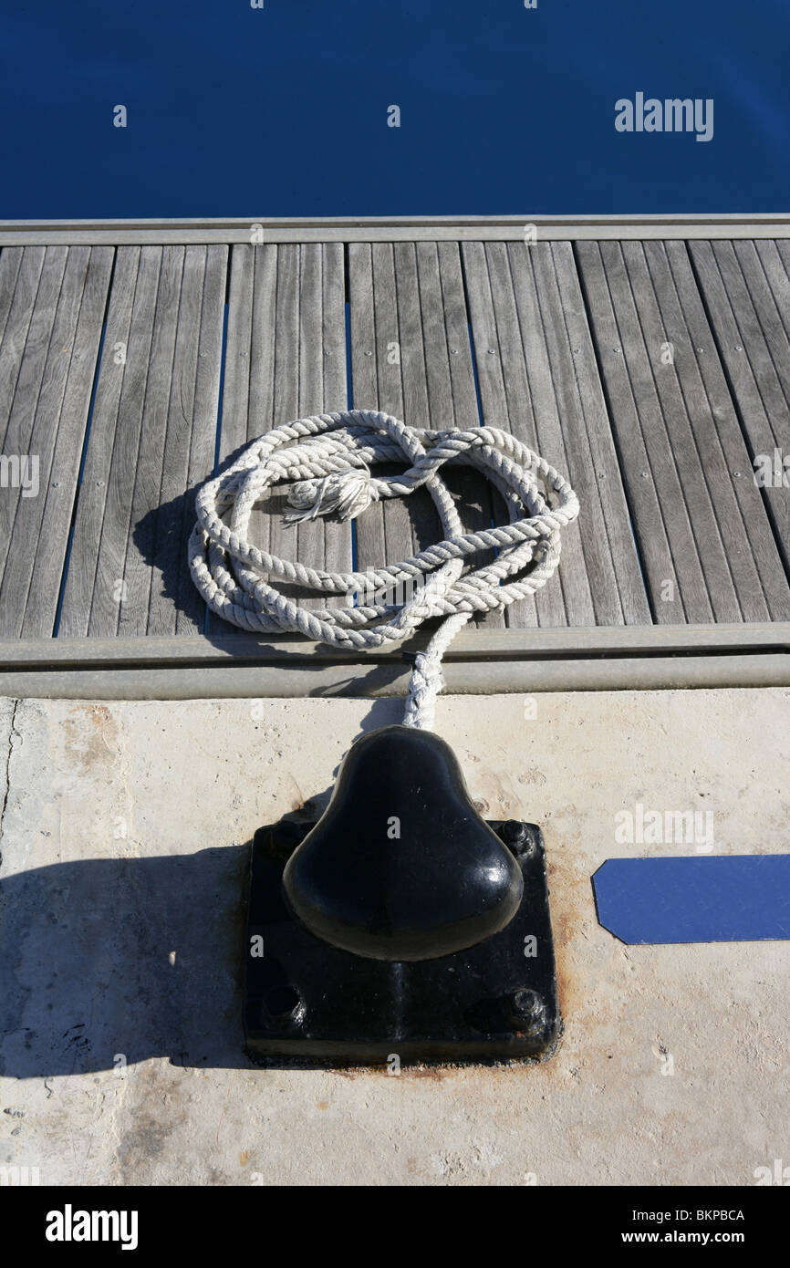 Marina nautical mooring with thread and blue water on background Stock ...
