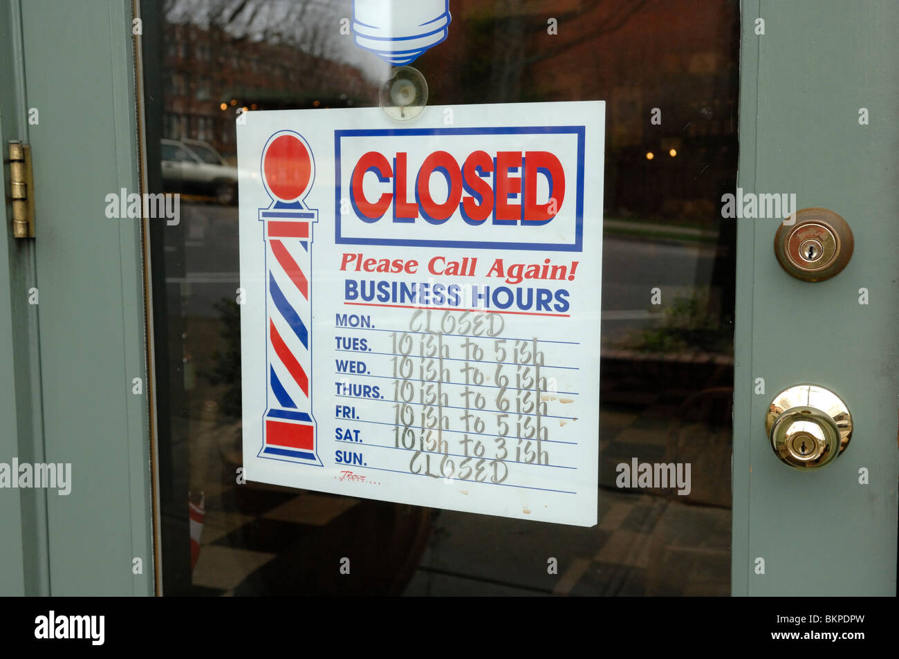 Closed Sign on a barbers shop door Stock Photo Alamy