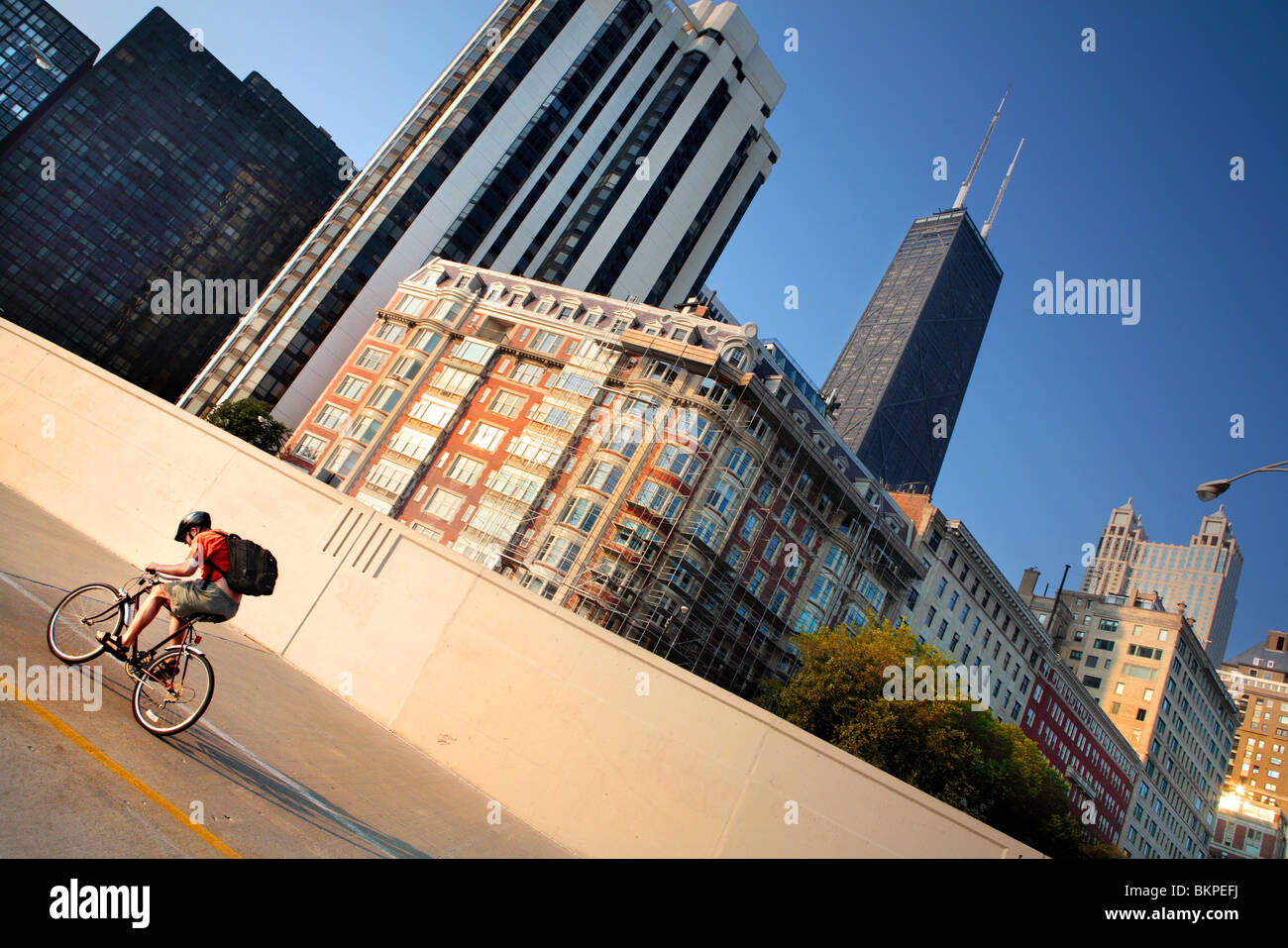 BIKER ON THE LAKEFRONT PATH ALONG THE GOLD COAST, CHICAGO, ILLINOIS, USA  Stock Photo