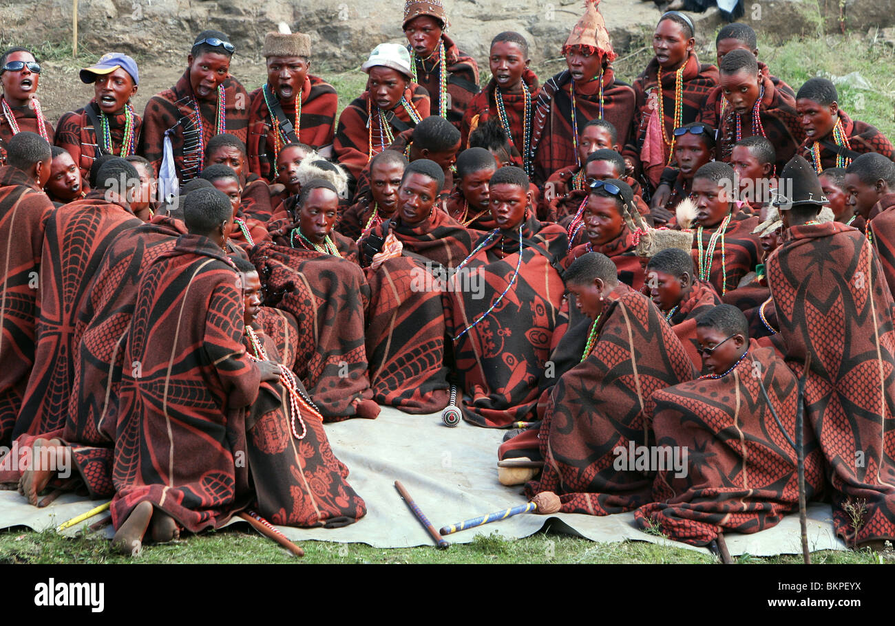 Lesotho: Redly made up young men celebrate an initiation celebration their admission into the world of adult men. Stock Photo