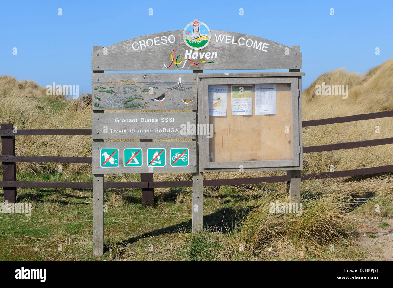 Old beach access sign on the Haven caravan park in Prestatyn, Wales Stock Photo