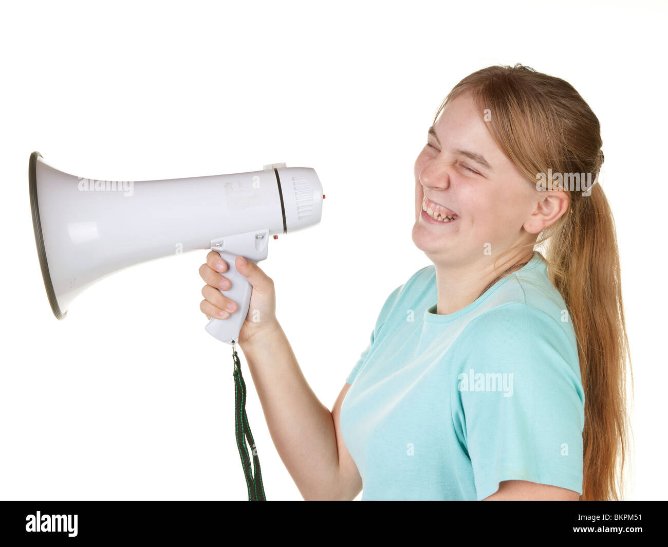 teenage girl telling a joke with a megaphone Stock Photo Alamy