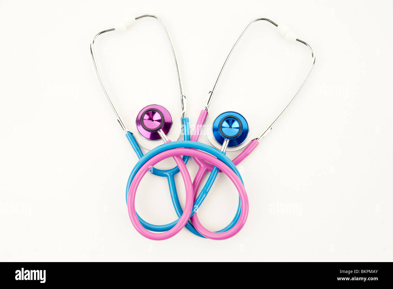 great image of pink and blue stethoscopes Stock Photo