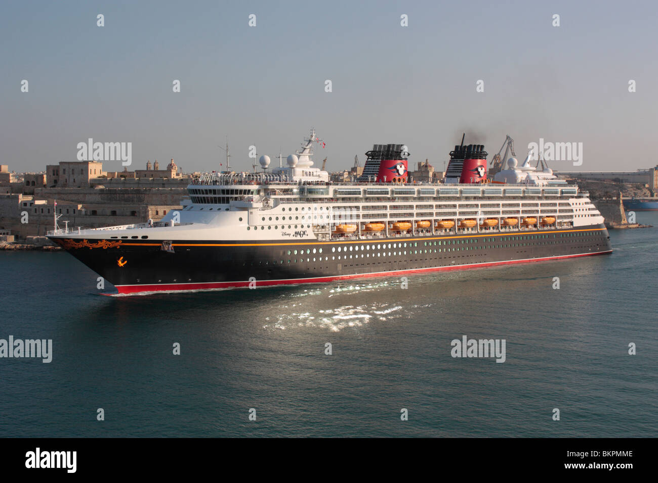 The cruise ship Disney Magic departing from Malta Stock Photo