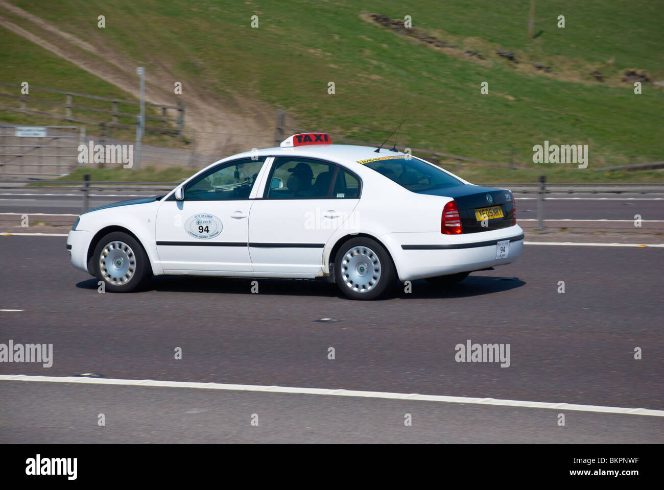 Taxi on the M62 motorway Stock Photo