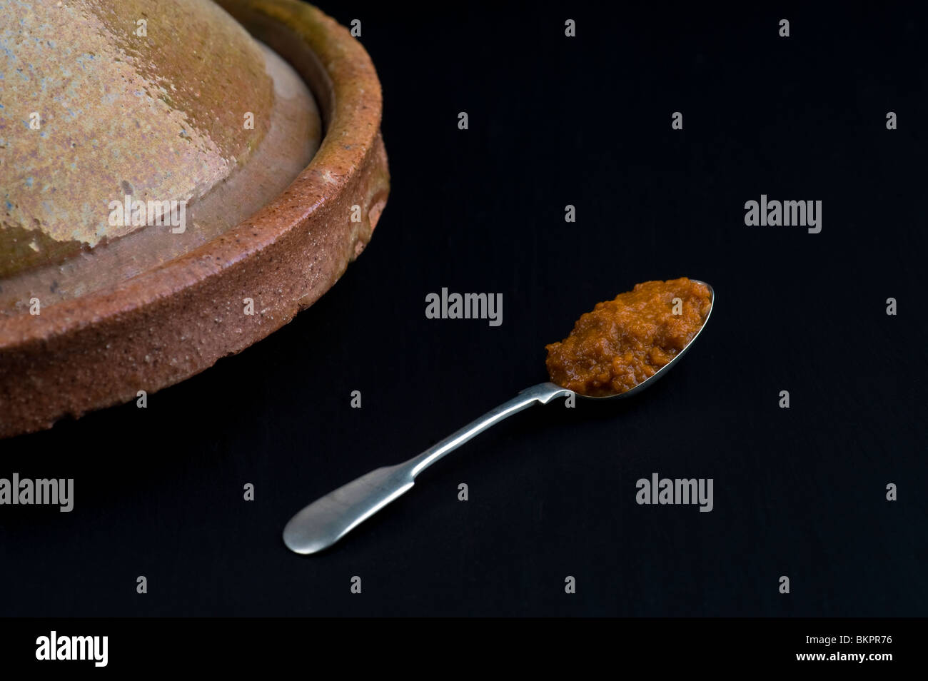 Spoonful of Harissa Paste Stock Photo