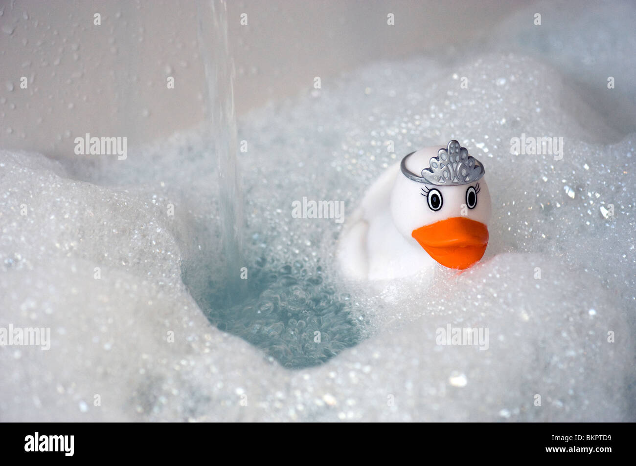 Rubber Duck in Running Bubble Bath Stock Photo - Alamy