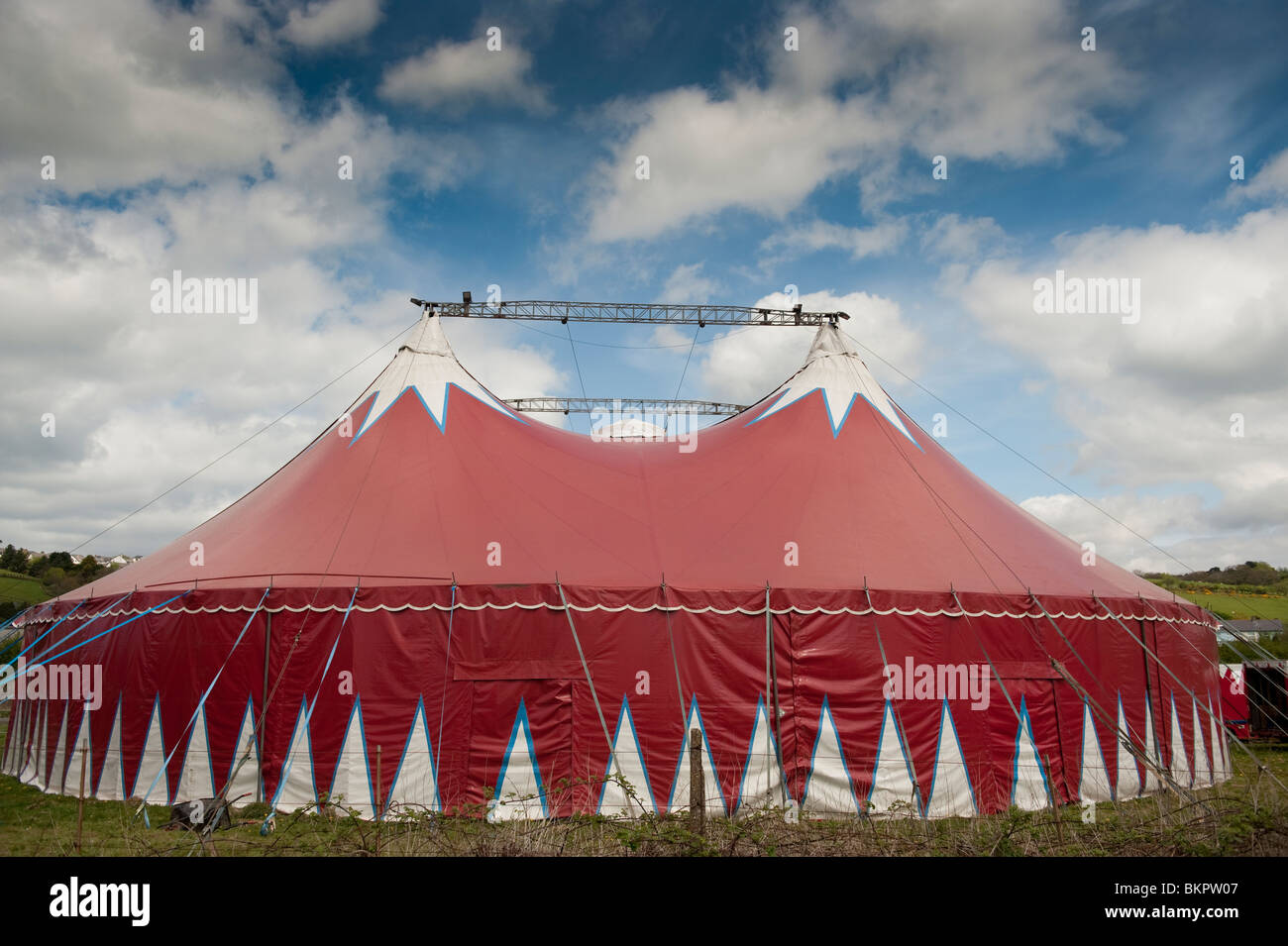 The Big Kid travelling circus red coloured big top tent, visiting Aberystwyth Wales UK Stock Photo