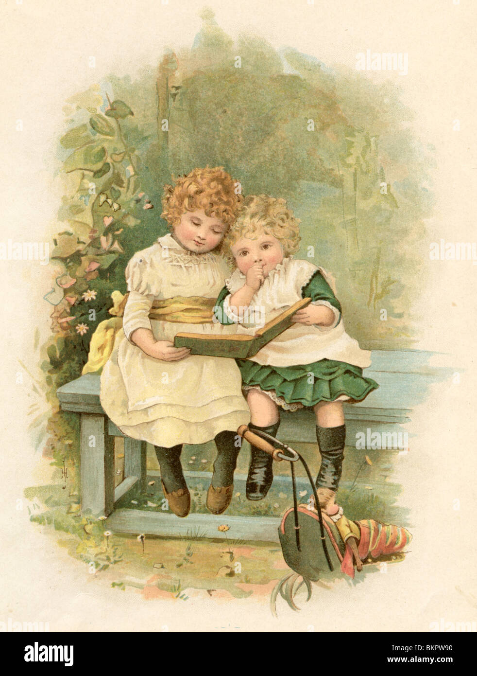 Sisters sat on The Garden Bench Reading a Book Stock Photo Alamy