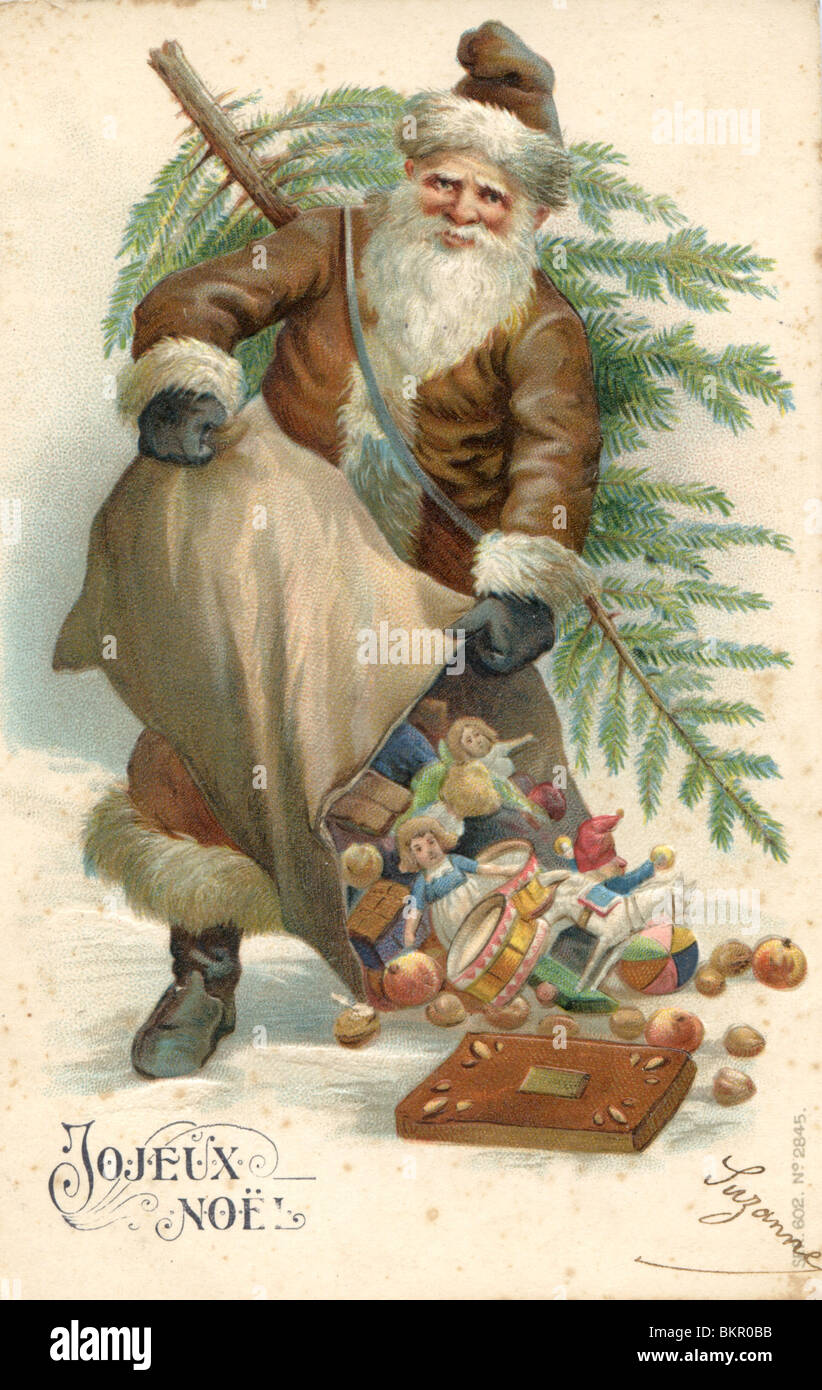 Father Christmas Emptying the Toys from his Sack Stock Photo