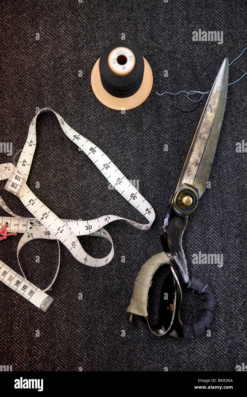 Equipment For Designing Clothes, Measuring Tape, Wooden Scale And Scissors  On Black Fabric Stock Photo, Picture and Royalty Free Image. Image 53653392.