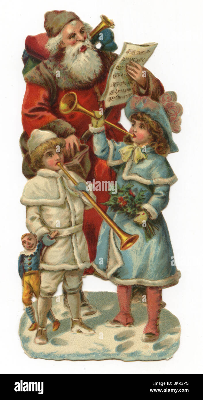 Father Christmas with Sack of Toys and Two Young Children Stock Photo